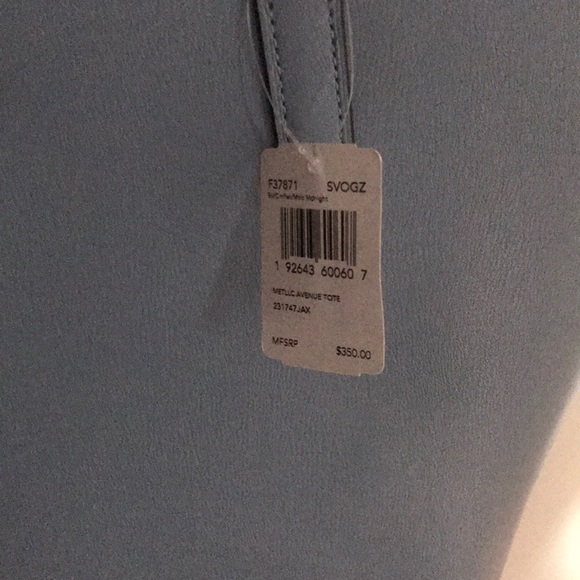 Coach - Picture 2 of 3